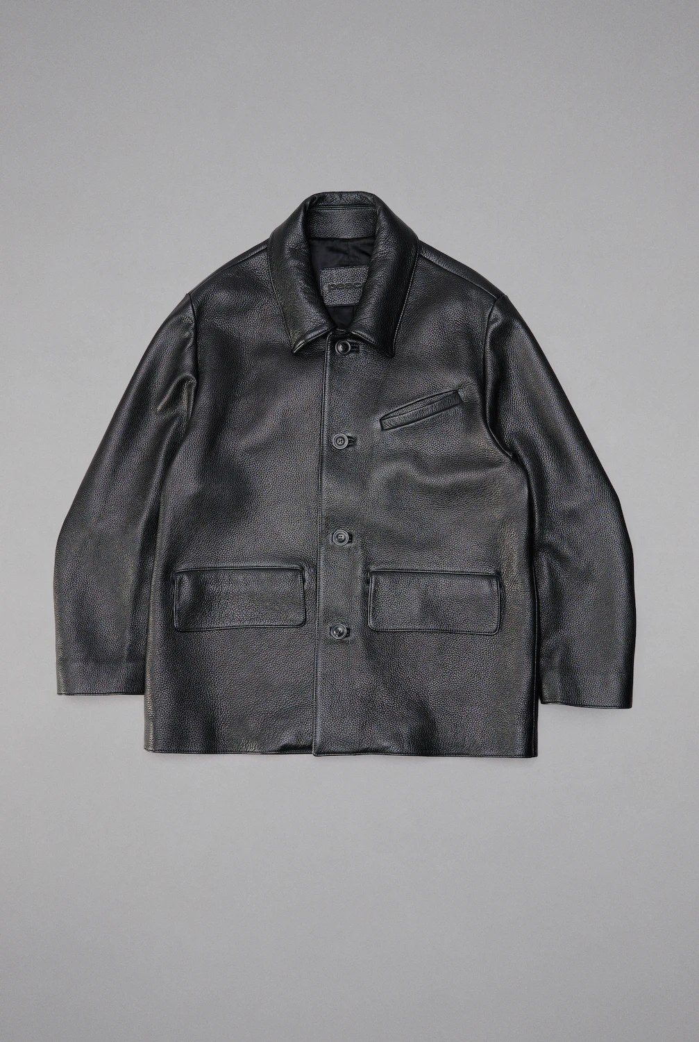 Peace Begins Within black leather jacket flat lay photography
