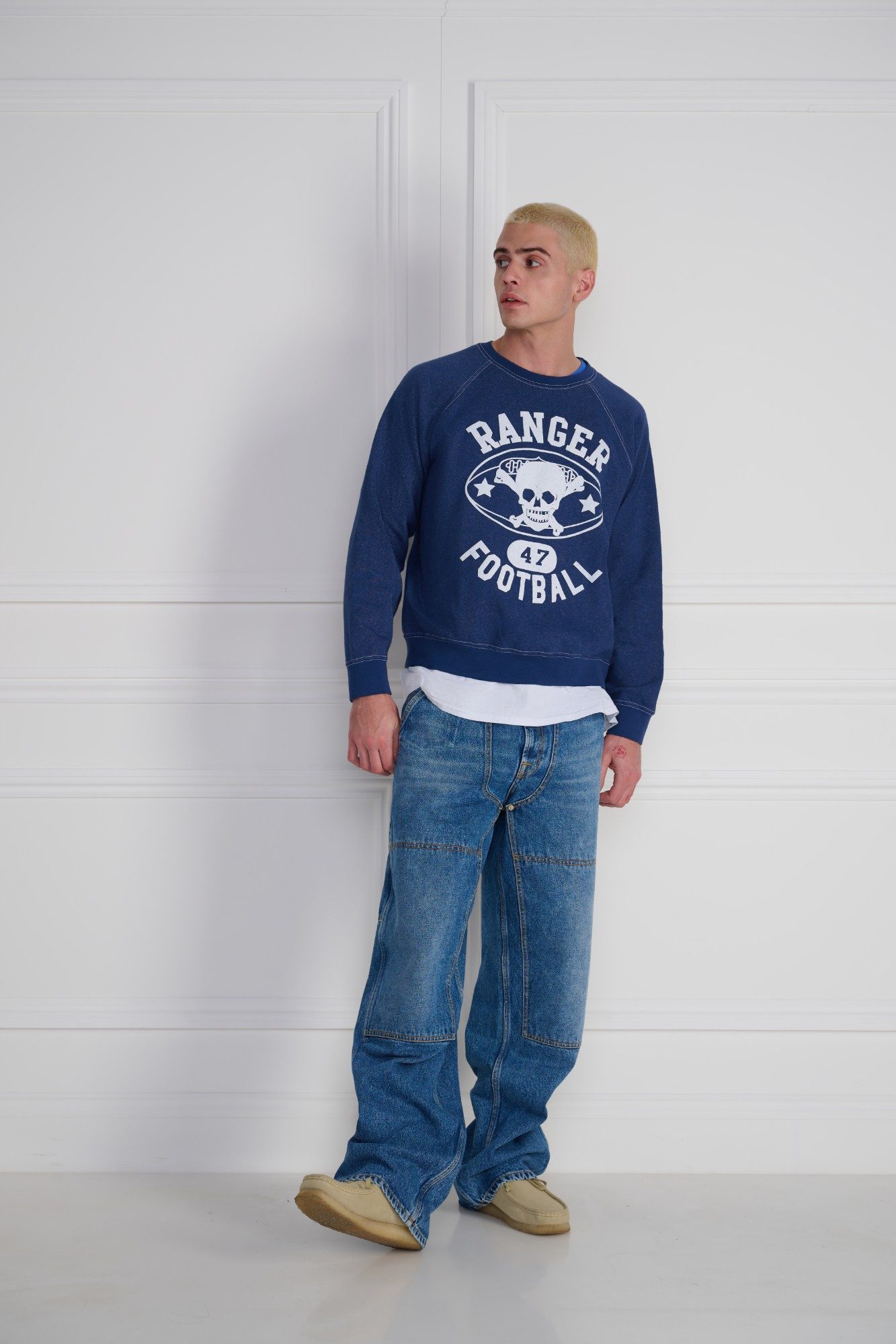 Wild Donkey Ranger Football sweatshirt and wide jeans on model
