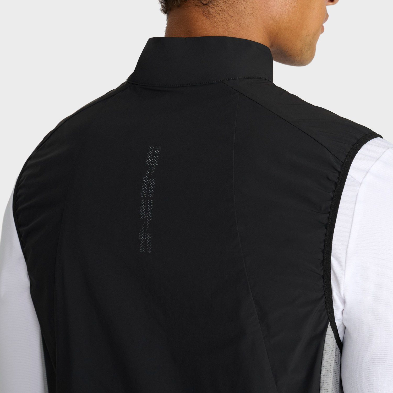 Yelir World gilet back panel detail photographed for ecommerce